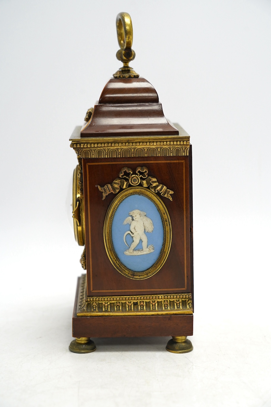 A 19th century French ormolu mounted, mahogany and box wood inlaid timepiece, by Planchon of Paris, with Wedgwood style plaques inlaid to sides, key included, 23cm. Condition - fair to good, not tested as working